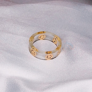 Yellow smiley face resin ring