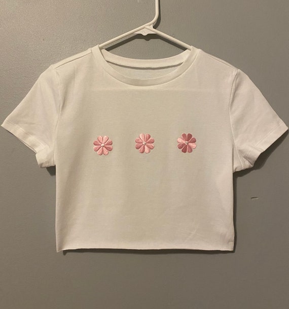 Trendy white crop top with pink flowers
