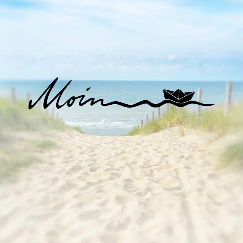 May include: A scenic image of a sandy path leading to the ocean, with the word "Moin" in elegant script. A black paper boat floats on the water, adding a nautical touch. The background features a blue sky and ocean.