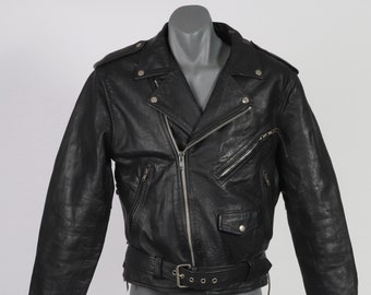 May include: A black leather motorcycle jacket with a zipper closure, a belt, and multiple pockets.