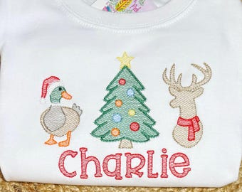 パーソナライズされたダッククリスマス刺繍シャツ - カスタムネーム | 子供用ホリデーシャツ | 農場の動物のクリスマス衣装、幼児用ハンティングTシャツ