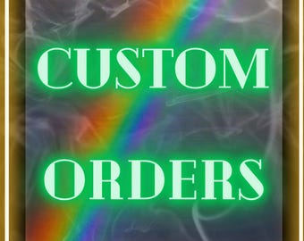 May include: A square graphic featuring the text CUSTOM ORDERS in bright green capital letters. The background displays a swirling, smoky grey texture with a diagonal rainbow gradient effect, all framed by a thick, solid gold-coloured border.