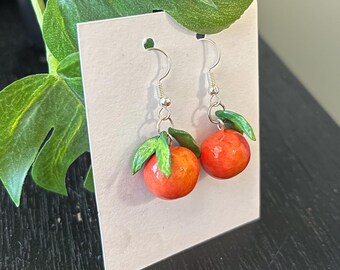 Orecchini di pesche fatti a mano