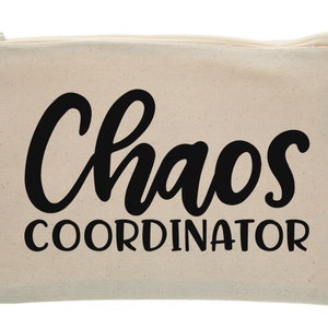 May include: A beige canvas zippered pouch with black text that reads "Chaos Coordinator".