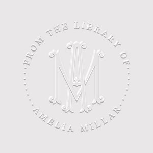 May include: White embossed circle with the text "From the Library of Amelia Millar" and a monogram of the letters "AM" in a decorative font.