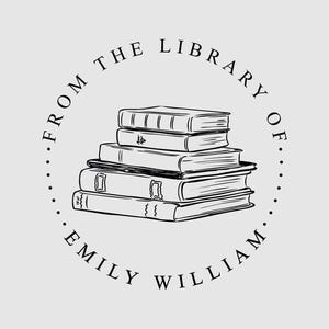 May include: A circular black and white stamp design featuring a stack of three books in the center. The text FROM THE LIBRARY OF EMILY WILLIAM is written in a circular border around the books, using a clean, serif font for the lettering.