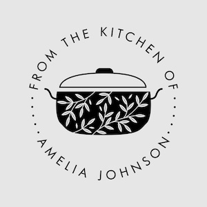 May include: A circular black and white stamp design featuring a central cooking pot with a lid and a white leaf pattern. The text reads FROM THE KITCHEN OF in an arc above the pot and AMELIA JOHNSON in an arc below the pot, all on a light gray background.