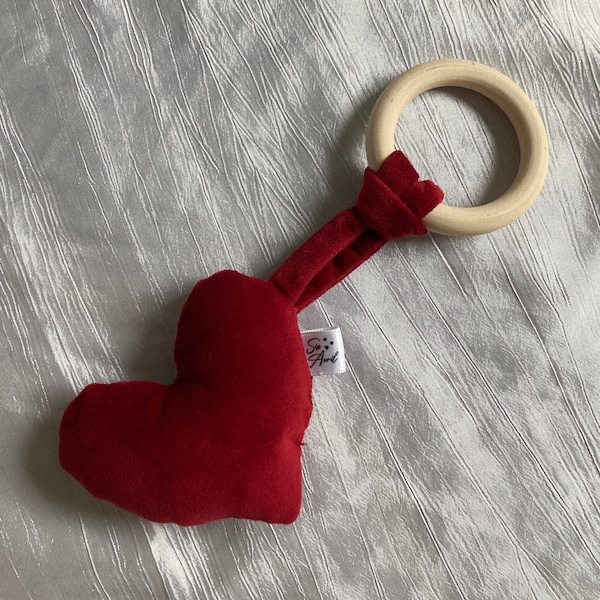Natural wooden teether ring rattle in the shape of a red heart for children and babies with bell key ring for women