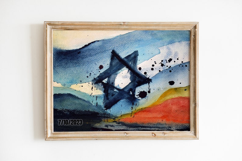 May include: A framed watercolor painting of a blue Star of David with a yellow, orange, and blue background. The date "7/10/2023" is written in the bottom left corner.