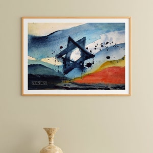 May include: Abstract watercolor painting of a Star of David in blue, yellow, and red hues. The painting is framed and has the date "7/10/2023" in the bottom left corner.