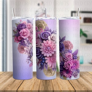 May include: Three stainless steel tumblers featuring a purple and pink floral design. The tumblers have a gradient background that fades from a light purple to white.
