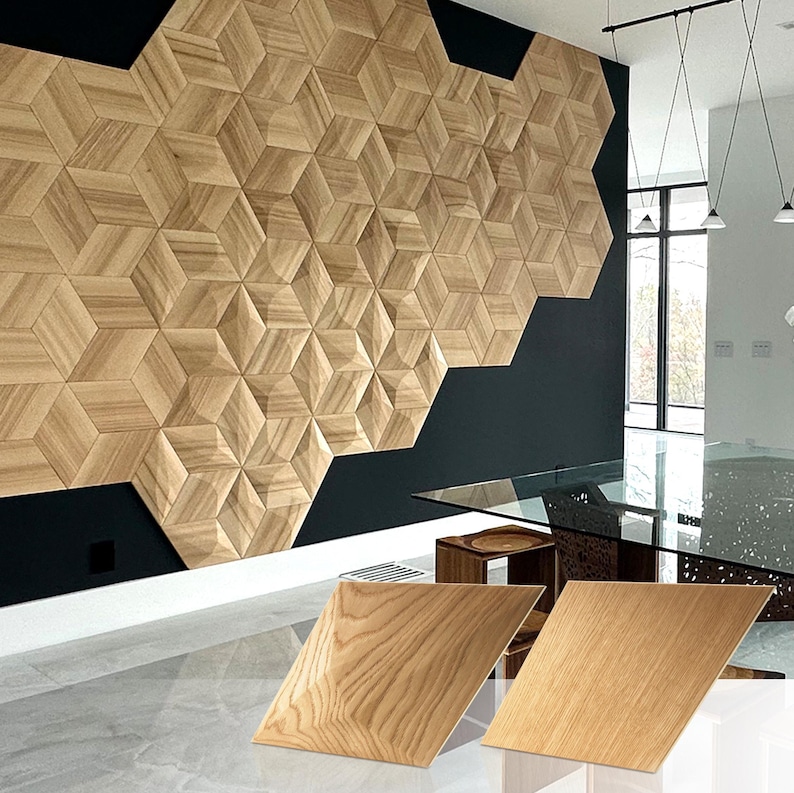 May include: A geometric wooden wall panel installation featuring a repeating pattern of three-dimensional hexagonal shapes. The panels are made of light-colored wood, creating a textured surface. Two additional wood panels are displayed in the foreground.