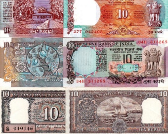 May include: A collection of vintage Indian banknotes featuring different denominations, including 5, 10, and 20 rupees. The banknotes are in various colors, including green, red, blue, and brown. Each banknote features a unique design, including images of a tractor, a building, peacocks, a lion, a boat, and a wheel.