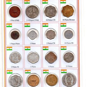 May include: A collection of old Indian coins from 1950 to 2000, displayed in a white frame with a green, white and orange Indian flag in each corner. The coins are arranged in rows and columns, with each coin labelled with its denomination and year of issue. The coins are in various states of wear and tear, but all are in good condition.