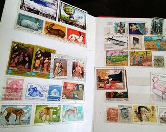 切手アルバム8ページ＋世界各国の使用済み切手100枚セット 希少な切手