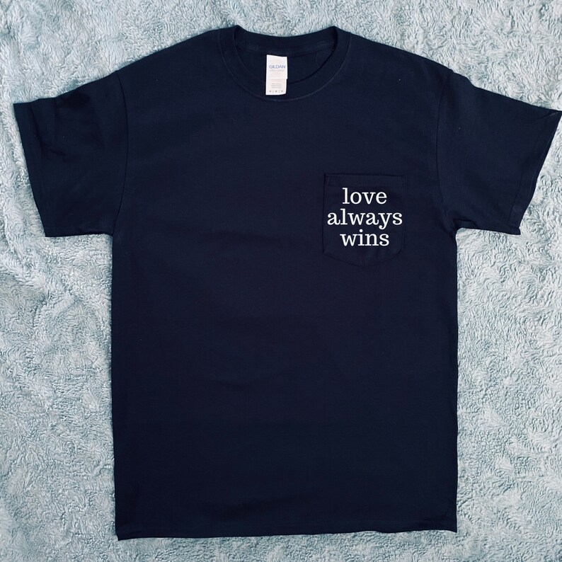 Love Always Wins Pocket Tee