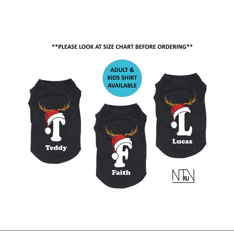 May include: Three black pet shirts with a Christmas theme. Each shirt features a white initial, a red Santa hat, and antlers. The names "Teddy", "Faith", and "Lucas" are printed below the initials. The text "ADULT & KIDS SHIRT AVAILABLE" is also visible.