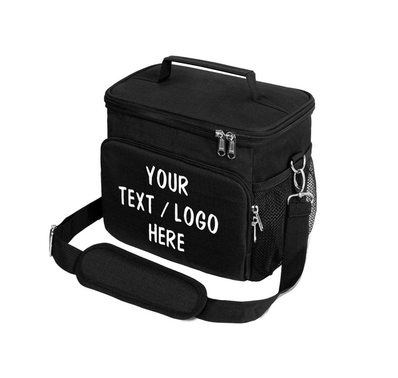 May include: Black insulated lunch bag with a shoulder strap and a zipper closure. The bag has a mesh pocket on the side and a white text that says "YOUR TEXT / LOGO HERE".