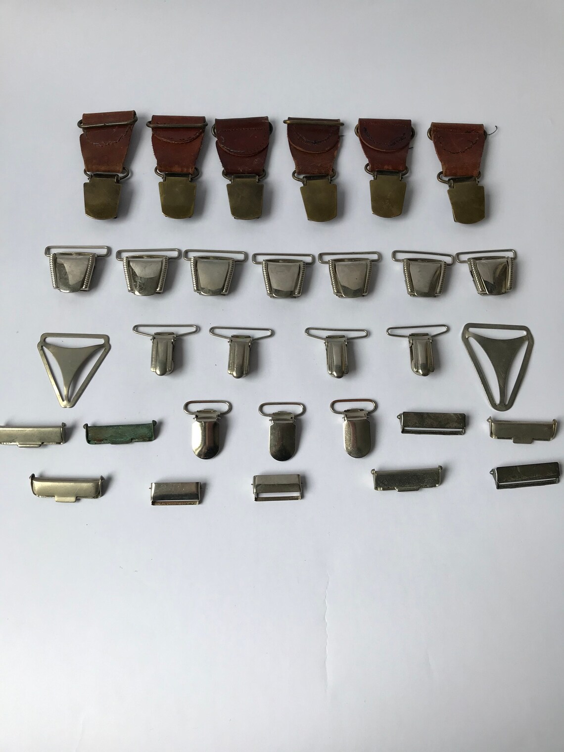 Vintage Set of 31 Pieces Suspenders Overalls Latching Hooks. Rounded