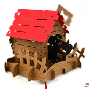Cartão pop-up da casinha de cachorro 3D.