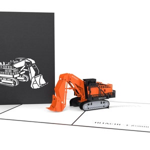 Carte de vœux pop-up excavatrice