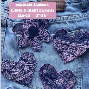 May include: Handmade bandana patches in flower and heart shapes, sewn onto denim. The patches are dark blue with a paisley design and pink accents. The text on the image reads "HANDMADE BANDANA FLOWER & HEART PATCHES SEW-ON 3"-3.5""