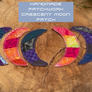 May include: Five handmade patchwork crescent moon patches in various colors, including purple, blue, green, orange, pink, and yellow. The patches are sewn together with a contrasting thread. "HANDMADE PATCHWORK CRESCENT MOON PATCH" is written in a blue box above the patches.