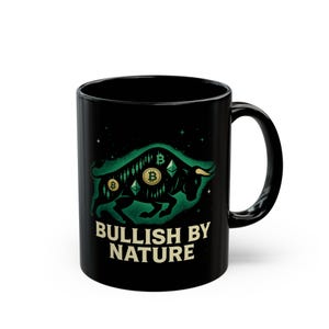 May include: Black ceramic mug with a green bull illustration, Bitcoin symbols, and the text "BULLISH BY NATURE." The design incorporates stars and geometric shapes, creating a crypto-themed aesthetic.