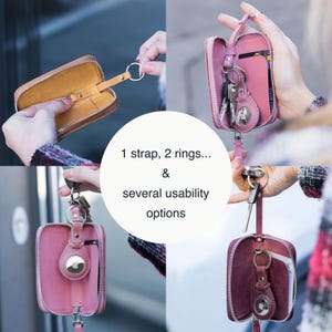May include: A collection of images showcasing a leather key case in various colors, including brown and pink. The case features a zipper closure, a strap, and multiple rings for keys and accessories. The text in the image reads: "1 strap, 2 rings... & several usability options."