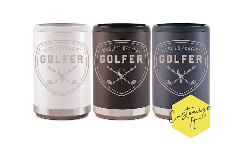 May include: Three insulated can coolers in white, black and blue. Each cooler features a graphic of crossed golf clubs and a golf ball with the text "World's Okayest Golfer".