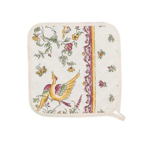 May include: A white quilted pot holder with a floral and bird design. The design features yellow, green, pink, and red colors. The pot holder has a white border.