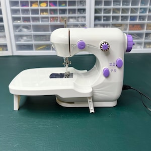 Mini Electric Sewing Machine: Portable DIY Clothing Crafting
