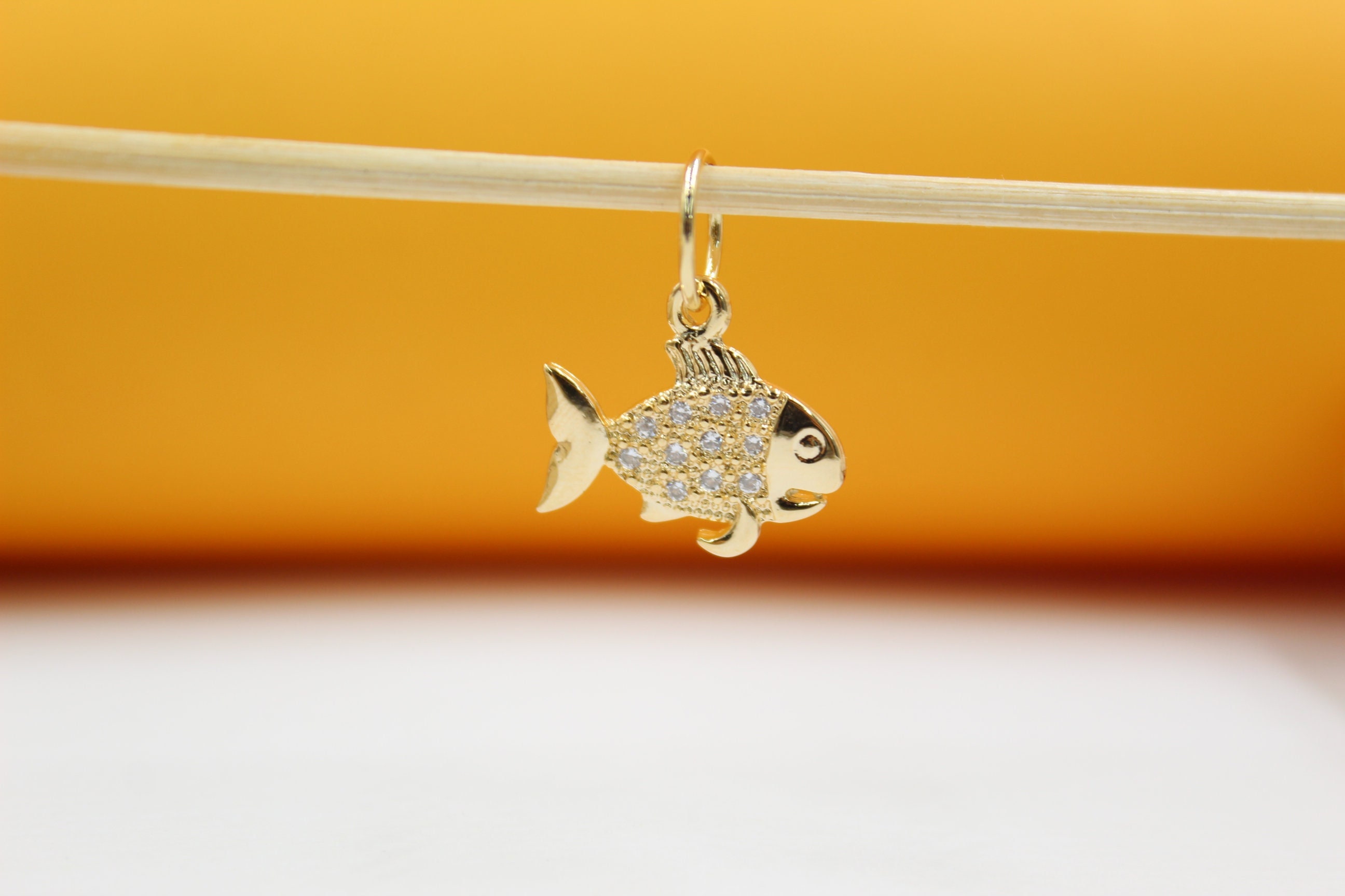 Gold Fish Pendant With Zirconia Stones 