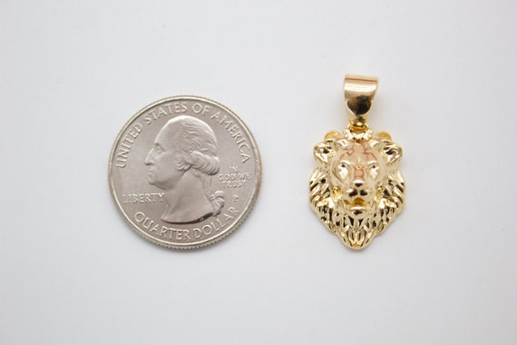 Small gold shop lion pendant