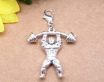 Bodybuilder mit Gewichte, Gewichtheber, Anhänger Karabiner, aktive Körpergestaltung, Krafttraining, Sport, Fitnessgeräte, Olympiade, Hanteln