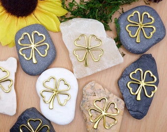 golden clover leaf on natural stone, gold clover leaf on stone, lucky charm, lucky clover, clover, clover leaf, natural stone decoration, creative stone