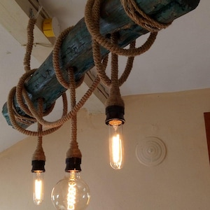 Wooden hanging lamp in a rustic style, on chains with decorative Edison bulbs, handmade