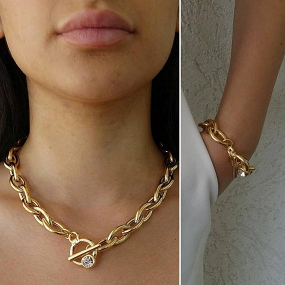Matching gold necklace and bracelet best sale