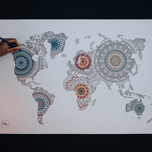 May include: A world map with mandala designs in each continent. The map is printed on white paper and is ready to be colored in.