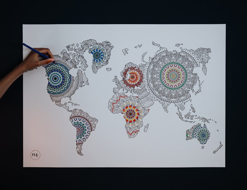 May include: A world map with mandala designs in each continent. The map is printed on white paper and is ready to be colored in.
