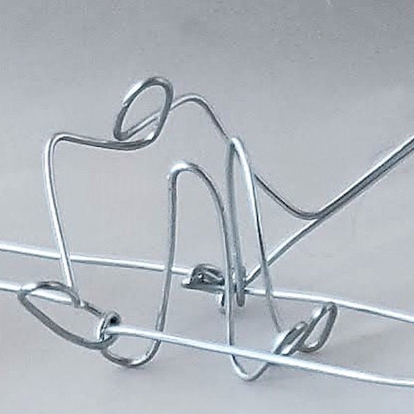 Figure simple de fil métallique d’un rameur simple