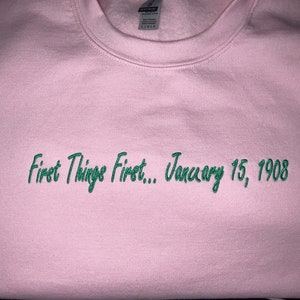 First Things First January 15, 1908 Pink and Green Embroidered Crewneck Sweatshirt