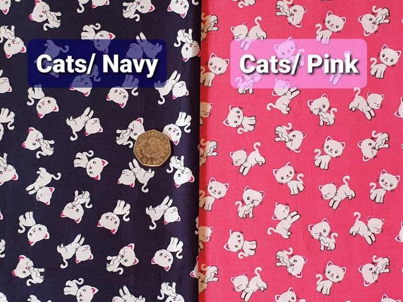 May include: Two fabric swatches with a white cat print on a navy blue background and a pink background. The text "Cats/Navy" is on the navy swatch and "Cats/Pink" is on the pink swatch.
