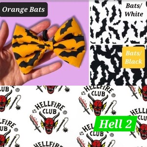May include: A set of three bow ties featuring a black bat pattern on a white, orange, and black background. The bow ties are shown on a pink background. The text "Orange Bats", "Bats/White", and "Bats/Black" are visible in the image. The text "Hellfire Club" is repeated in a pattern on a white background with a red devil head and other graphic elements.
