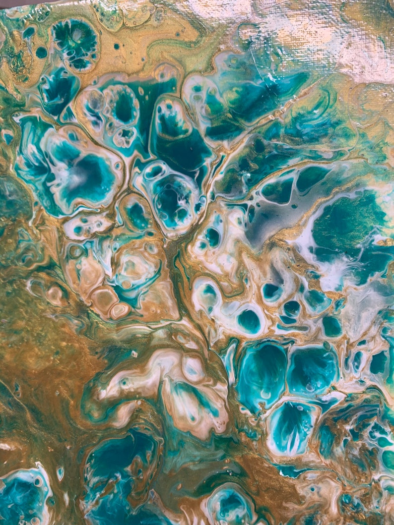 12x12\u201d green white and gold shimmery acrylic pour on canvas with lots of cells