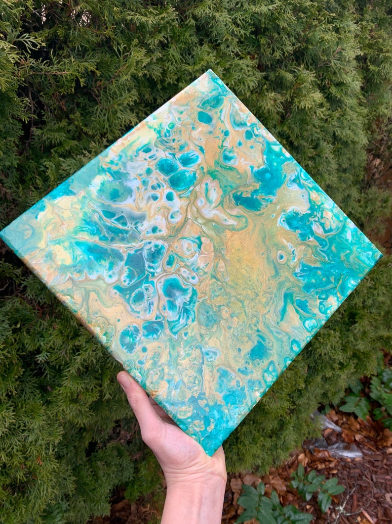 12x12\u201d green white and gold shimmery acrylic pour on canvas with lots of cells