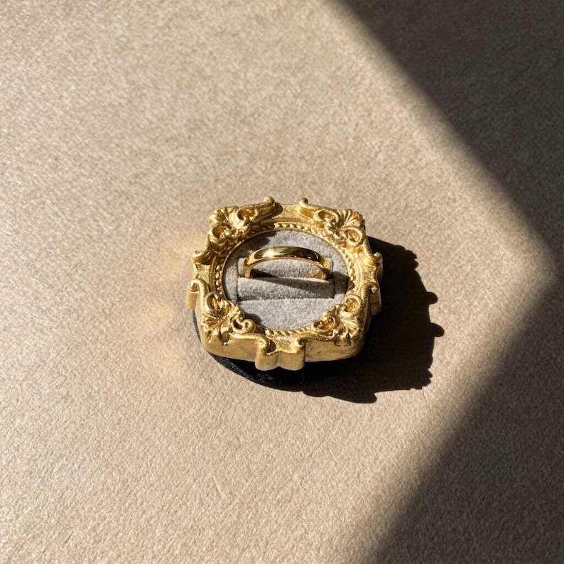 Velvet ring holder with vintage gold frame, engagement ring display. Ring box in multiple colors for wedding and jewelry photography