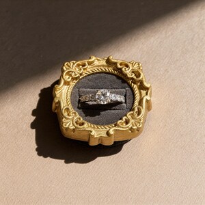 Velvet ring holder with vintage gold frame, engagement ring display. Ring box in multiple colors for wedding and jewelry photography