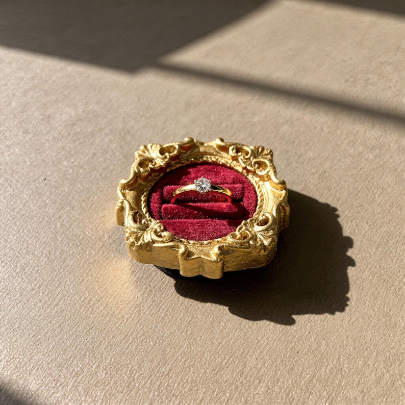 Velvet ring holder with vintage gold frame, engagement ring display. Ring box in multiple colors for wedding and jewelry photography