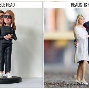 May include: A side-by-side comparison of two 3D printed figurines. The left figurine is a bobblehead style, with exaggerated features and a large head. The right figurine is a realistic style, with more natural proportions. Both figurines are of a couple standing together.